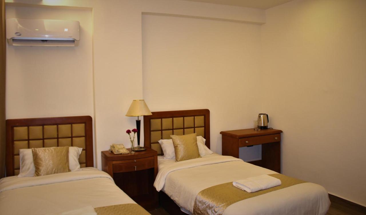 New Merryland Hotel Аман Екстериор снимка